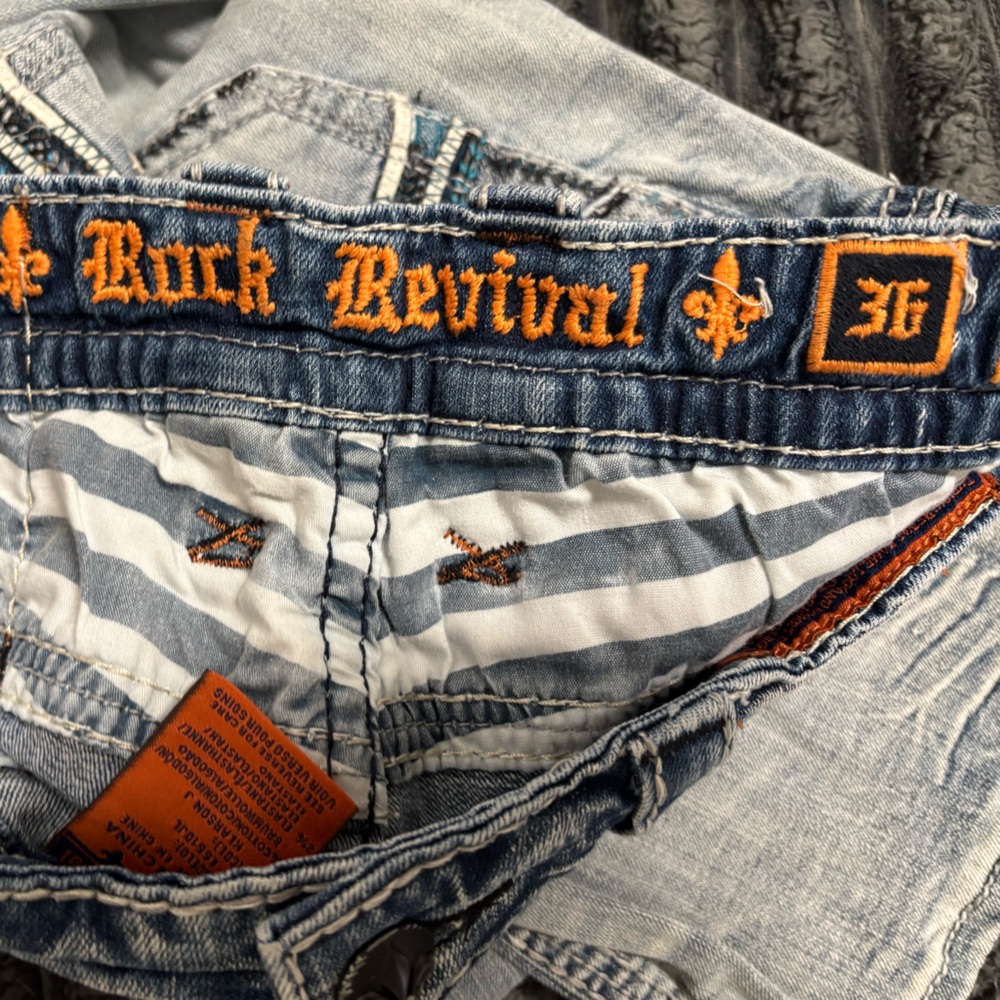 Rock Revival Light Blue Jeans with Orange Stitching